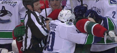 1323717963_hockey_referee_gets_punched.gif