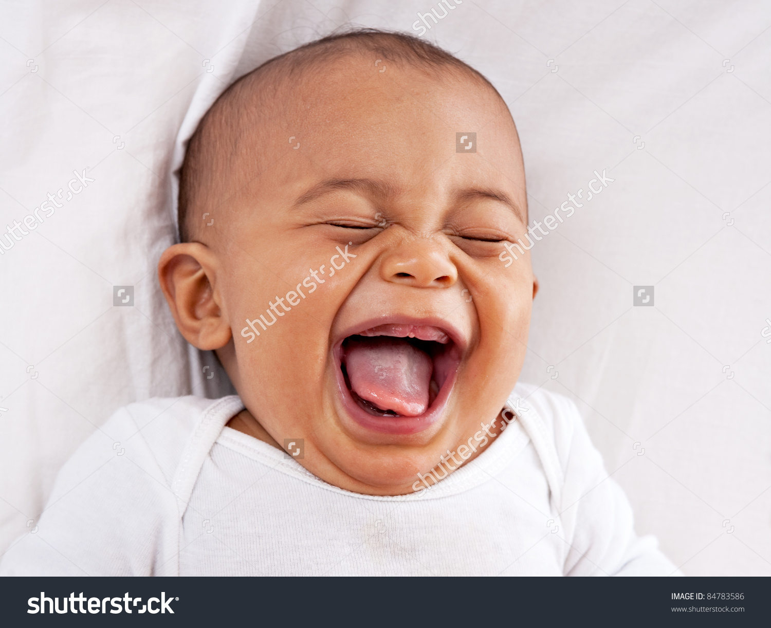 stock-photo-happy-big-laughing-month-old-african-american-baby-boy-84783586.jpg
