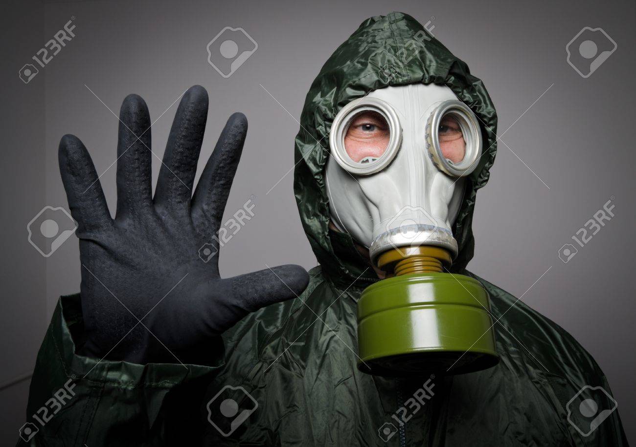21462450-man-wearing-a-gas-mask-on-his-face.jpg