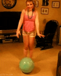 1260445021_girl_jumps_on_ball.gif