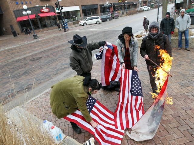 636210377835748572-IOW-0126-Flag-burning-05.jpg