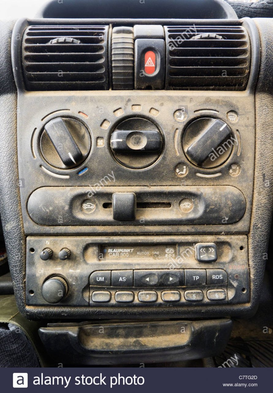 a-very-dirty-car-interior-and-dashboard-C7TG2D.jpg