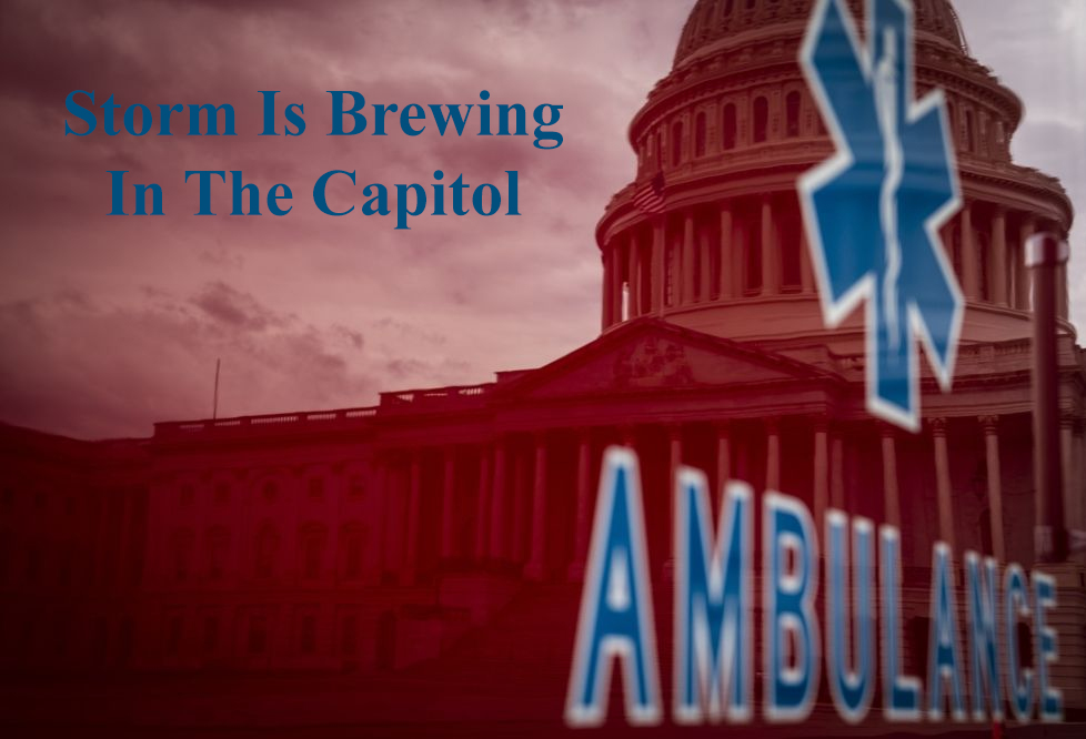 Ambulance reflected in Capital Bldg with words.jpg