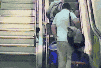 funny-gif-escalator-fall-bags-laying-down.gif