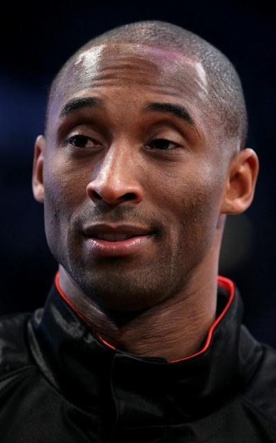 Kobe Bryant_s face while he his wearing a black jacket.JPG