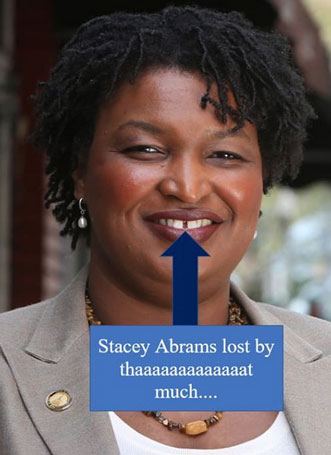 stacey-abrams-lost-tooth.jpg