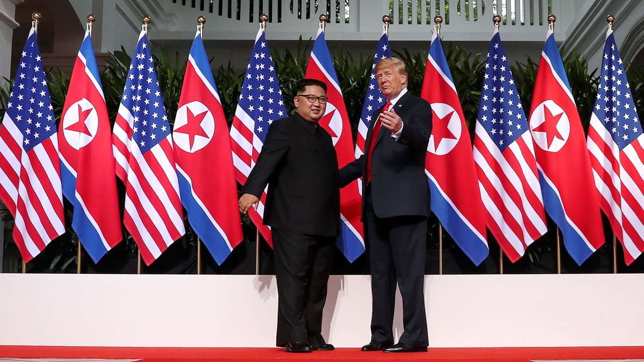 Trump-kim-US-north-korea-flags.jpg