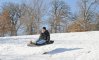 old-man-snow-sleding.jpg