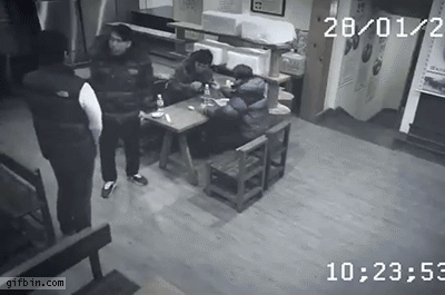 1424890129_girl_beats_men_in_restaurant.gif