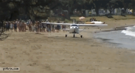 1392140403_plane_crashes_while_taking_off_on_a_beach.gif