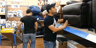 Man-Hits-Himself-With-Recliner-Chair.gif