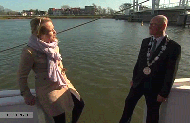 1397491497_reporter_falls_into_water_during_interview.gif