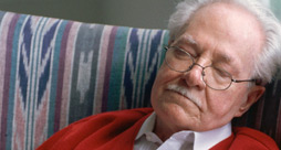 older-man-napping-in-cha.jpg