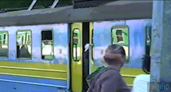 Guy-Jumps-Off-Moving-Train.gif
