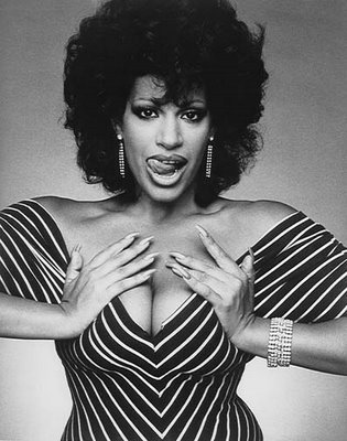 vanessa-del-rio-licking-lips-grabbing-tits.jpg