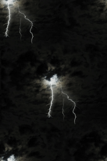 lightning_striking_the_night_sky.gif