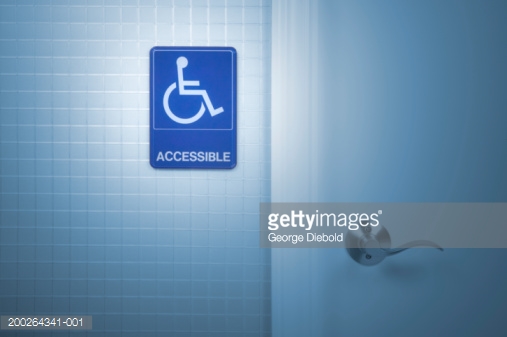 200264341-001-handicap-sign-outside-bathroom-door-gettyimages.jpg