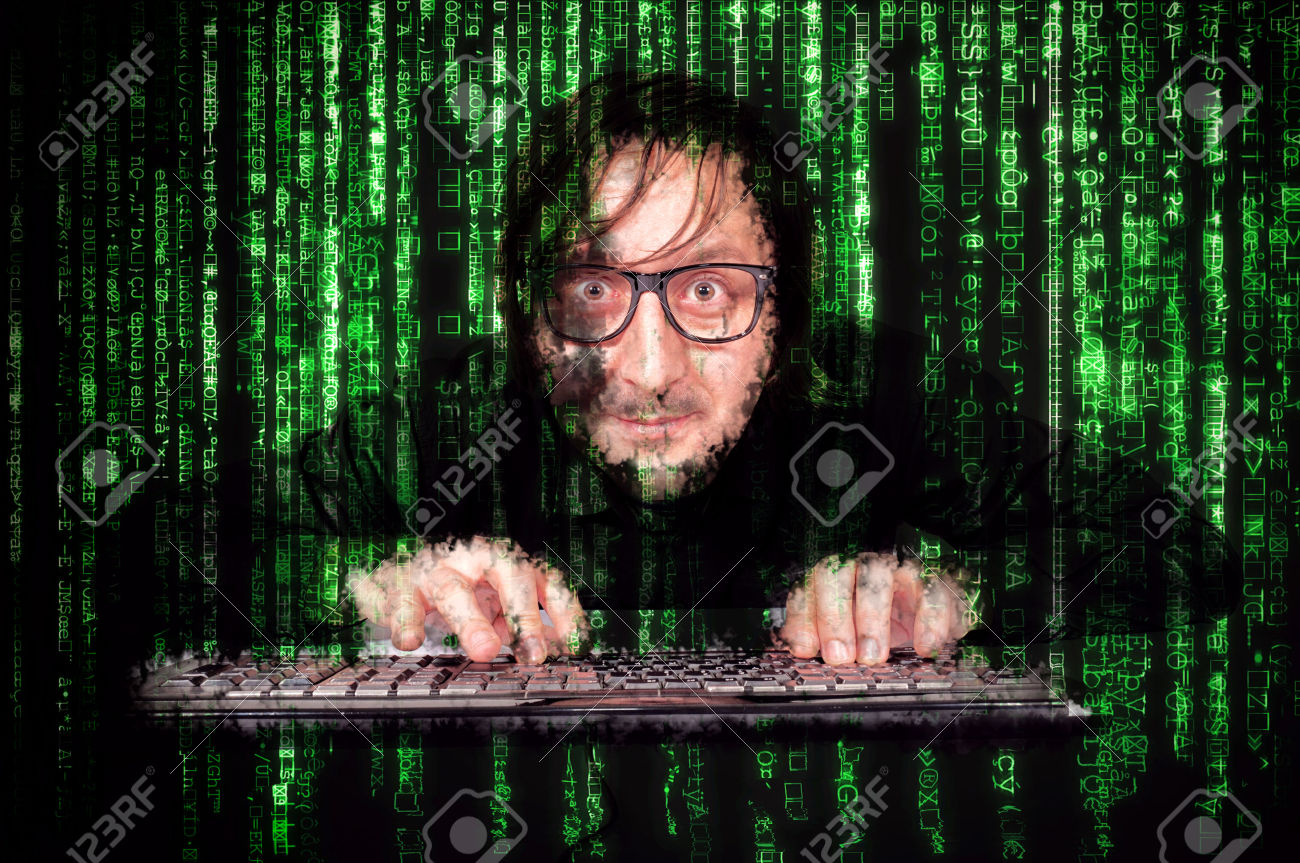 26053934-hacker-in-action-on-the-keyboard-with-matrix-background.jpg