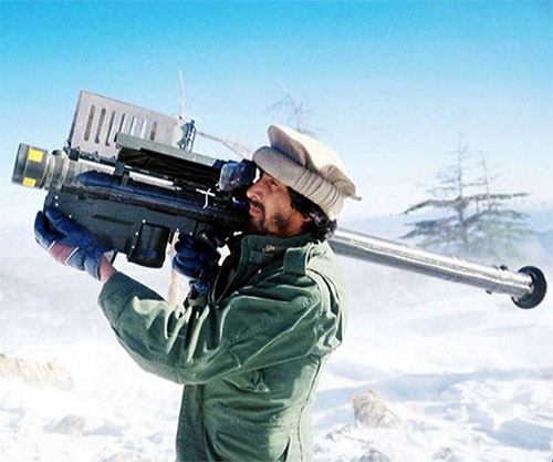 A-Mujahideen-fighter-aims-an-FIM-92-Stinger-missile-at-passing-aircraft-Afghanistan-1988-small.jpg