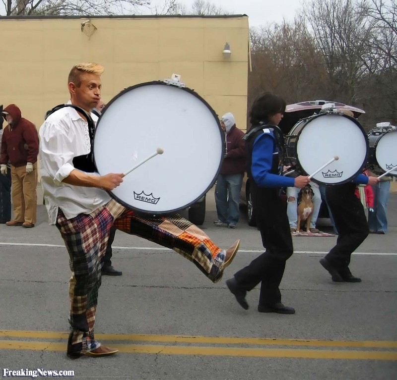 Funny-Man-with-a-Drum-in-Band--90839.jpg