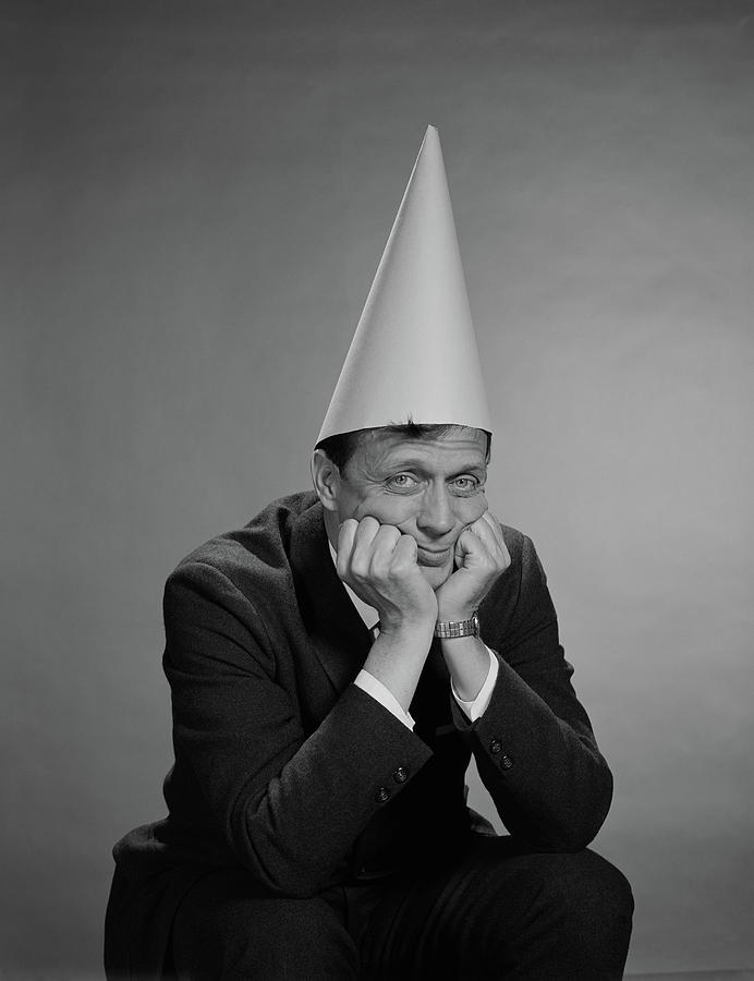 1960s-man-wearing-dunce-cap-vintage-images.jpg