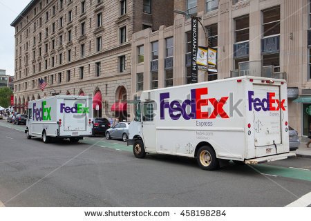 stock-photo-boston-massachusetts-usa-july-fedex-ground-truck-and-fedex-express-truck-on-the-same-458198284.jpg